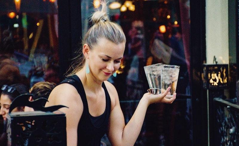 A waitress in a restaurant pato