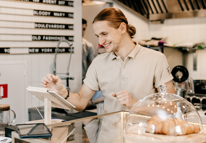A motivated restaurant employee A motivated restaurant employee