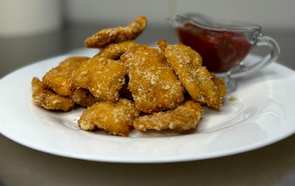 Курячі нагетси з фірмовим томатним соусом